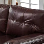 Divanetto 2 posti in similpelle trapuntata nera/marrone/bordeaux con contenitore